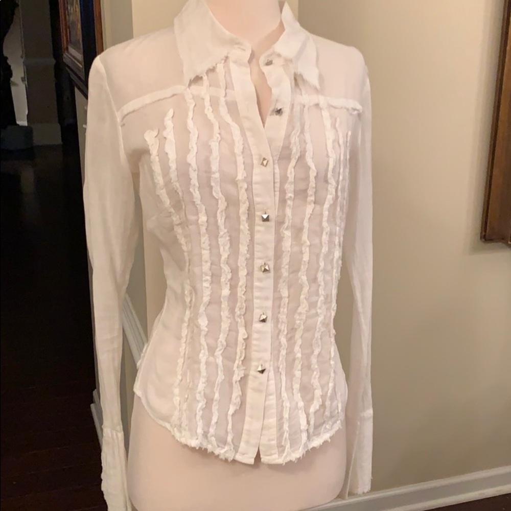 Beautiful blouse by Love Junkie.